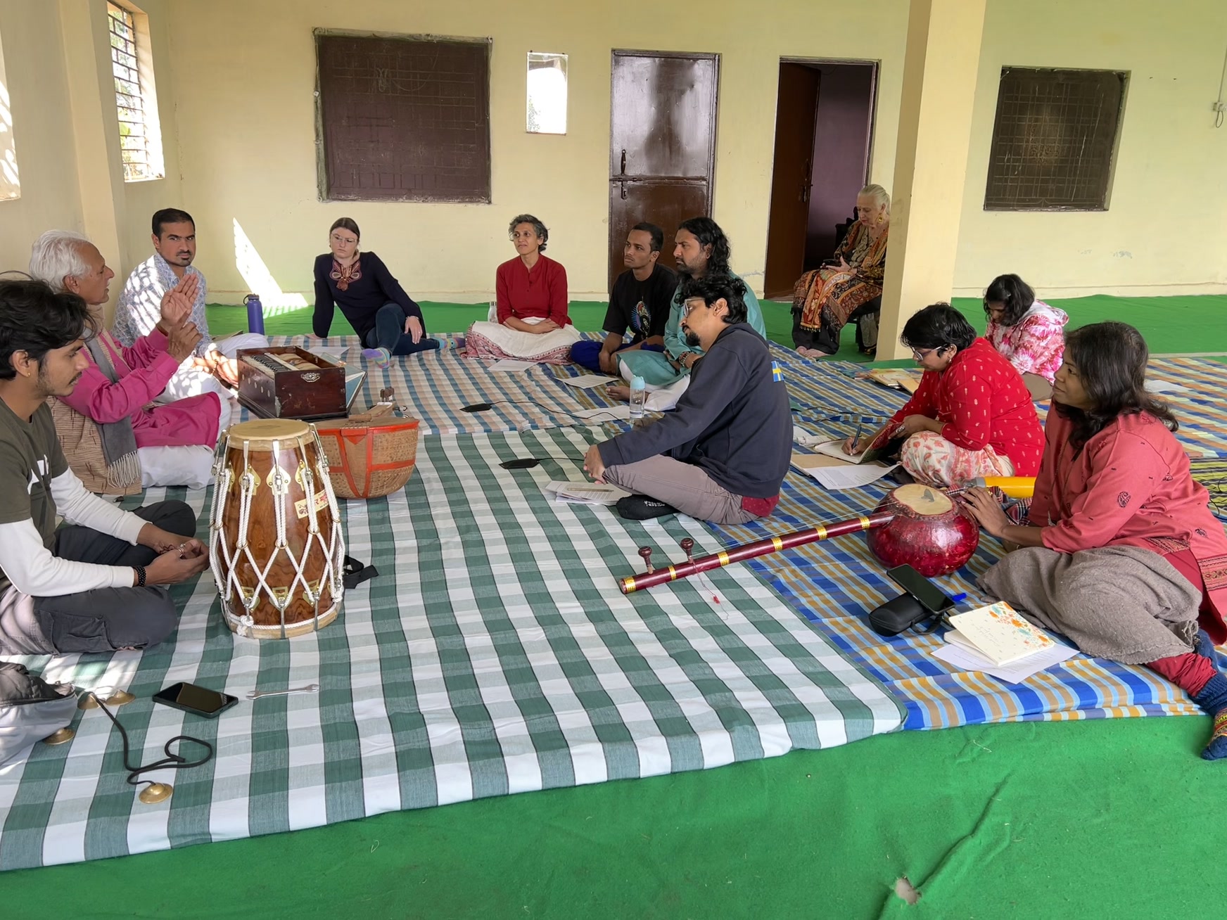 Participants gathered for a Naad Brahma retreat session